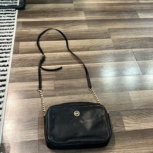 Michael Kors purse - perfect for dress down and dress up! Barely used!